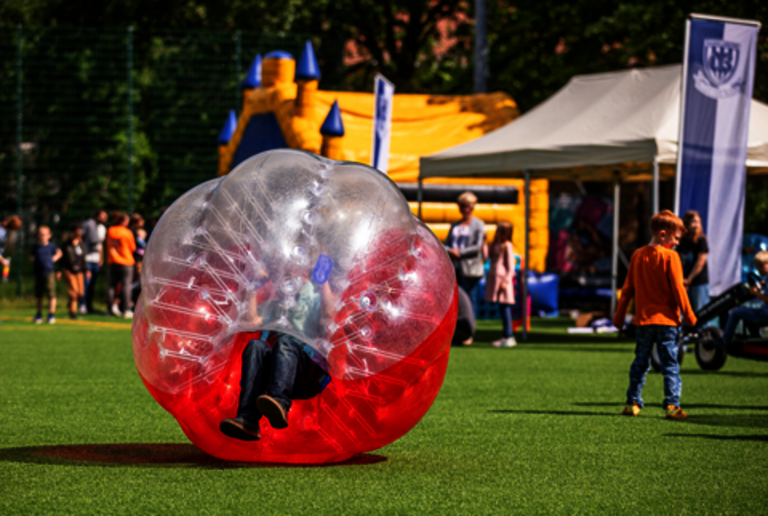  Tolerance Festival Potsdam Babelsberg Children playing on a meadow 